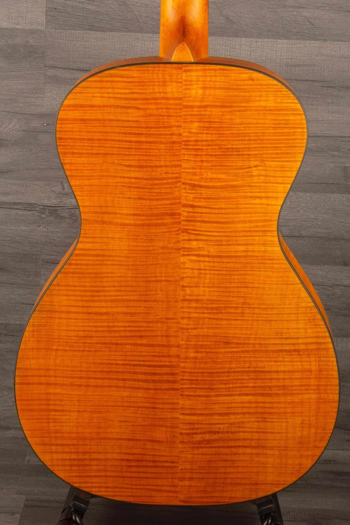 Back view of the Epiphone Dobro Hound Dog Deluxe Round Neck showcasing its flame maple body.