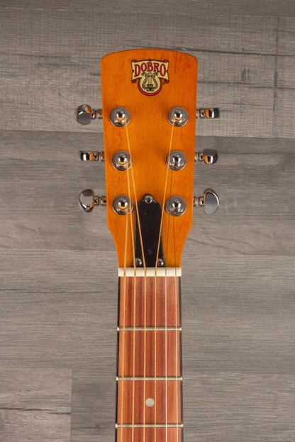Epiphone Dobro Hound Dog Deluxe Round Neck headstock showing tuning pegs and logo.