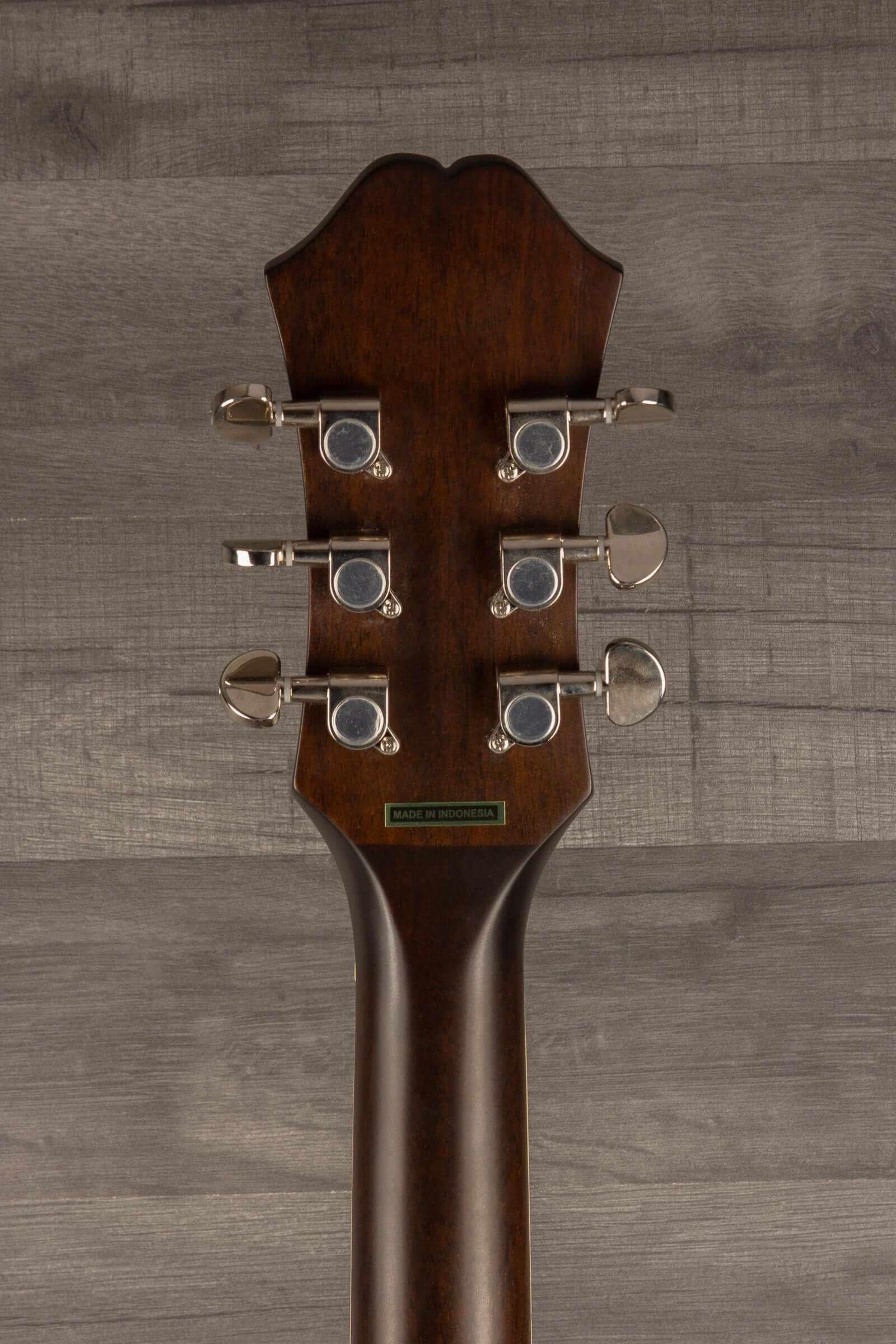 Epiphone J45 Studio Solid Top - Natural, Acoustic Guitar headstock with tuning pegs on a wooden background.