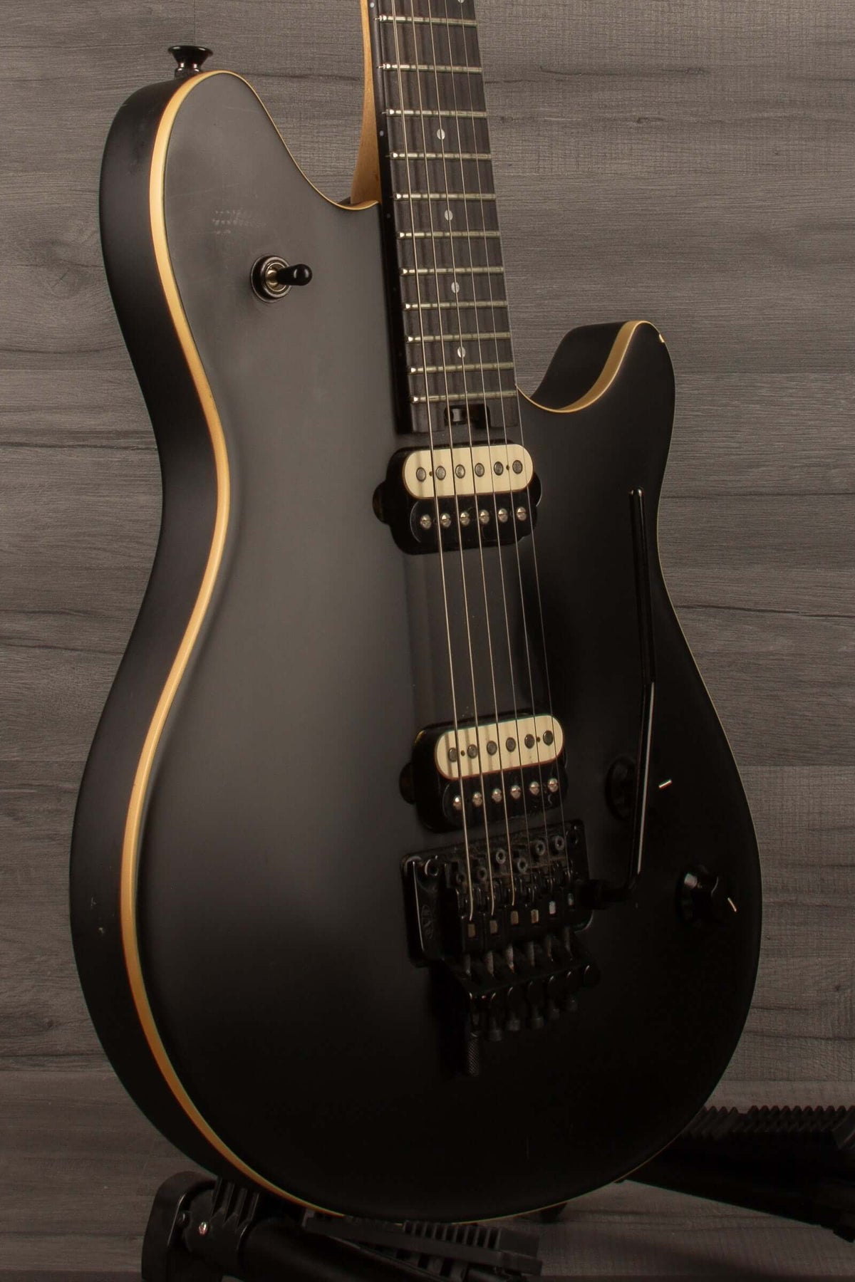 USED - EVH Wolfgang Special Stealth - Black (inc EVH hard case) side view showcasing its matte finish and features.