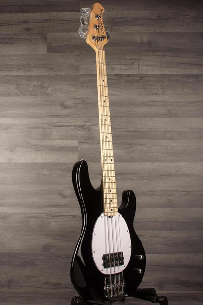 Sterling Stingray Intro series RAY2 Bass Guitar - Black displayed on a stand with poplar body and maple neck.