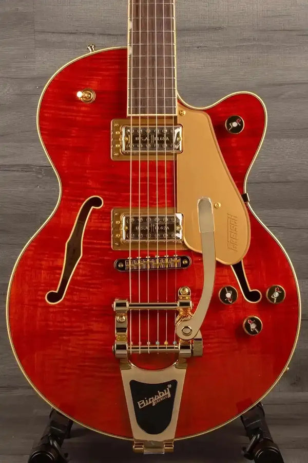 Gretsch Electromatic LTD Flame Okoume Broadkaster Jr. Single-Cut with Bigsby, showcasing its vibrant Roundup Orange finish.
