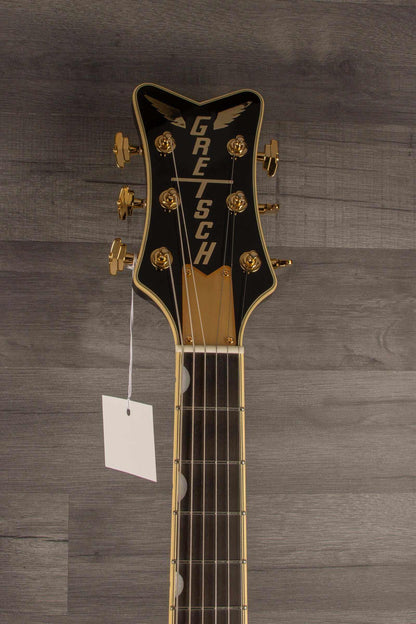 Gretsch G6134TG Limited Edition Paisley Penguin™ guitar headstock with gold tuners and tag.