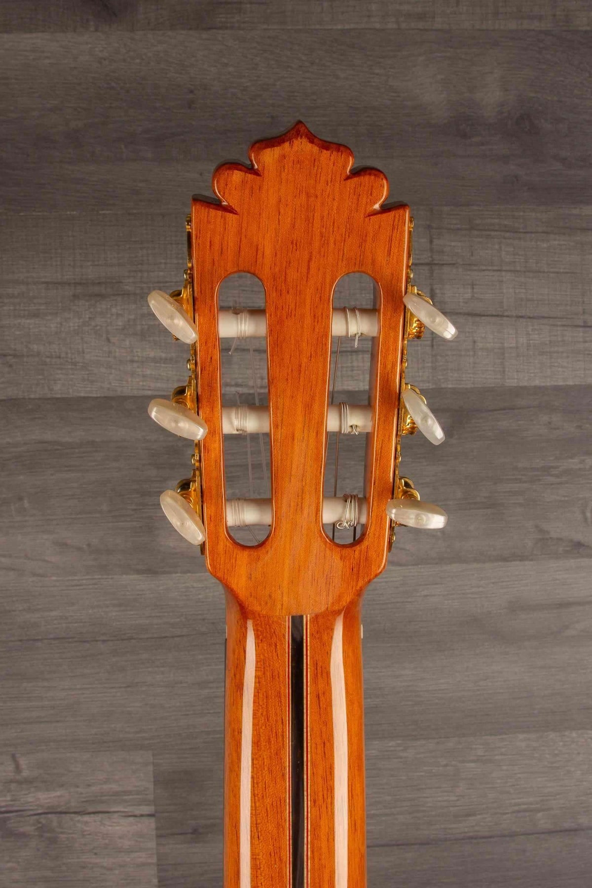 USED - Manuel Rodriguez model E guitar headstock with detailed craftsmanship and tuning pegs.