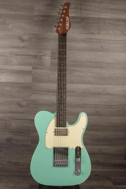 Schecter Nick Johnson USA PT Wembley in Atomic Green with nitro finish for vintage aesthetic.