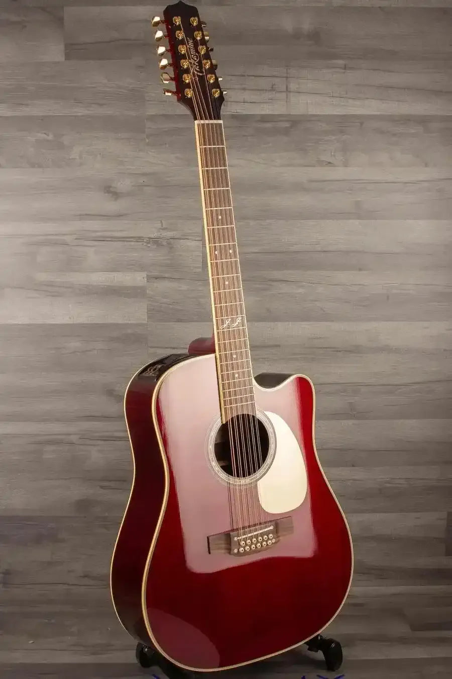 Takamine JJ325SRCL-12 John Jorgenson 12 string acoustic guitar with a stunning red finish.