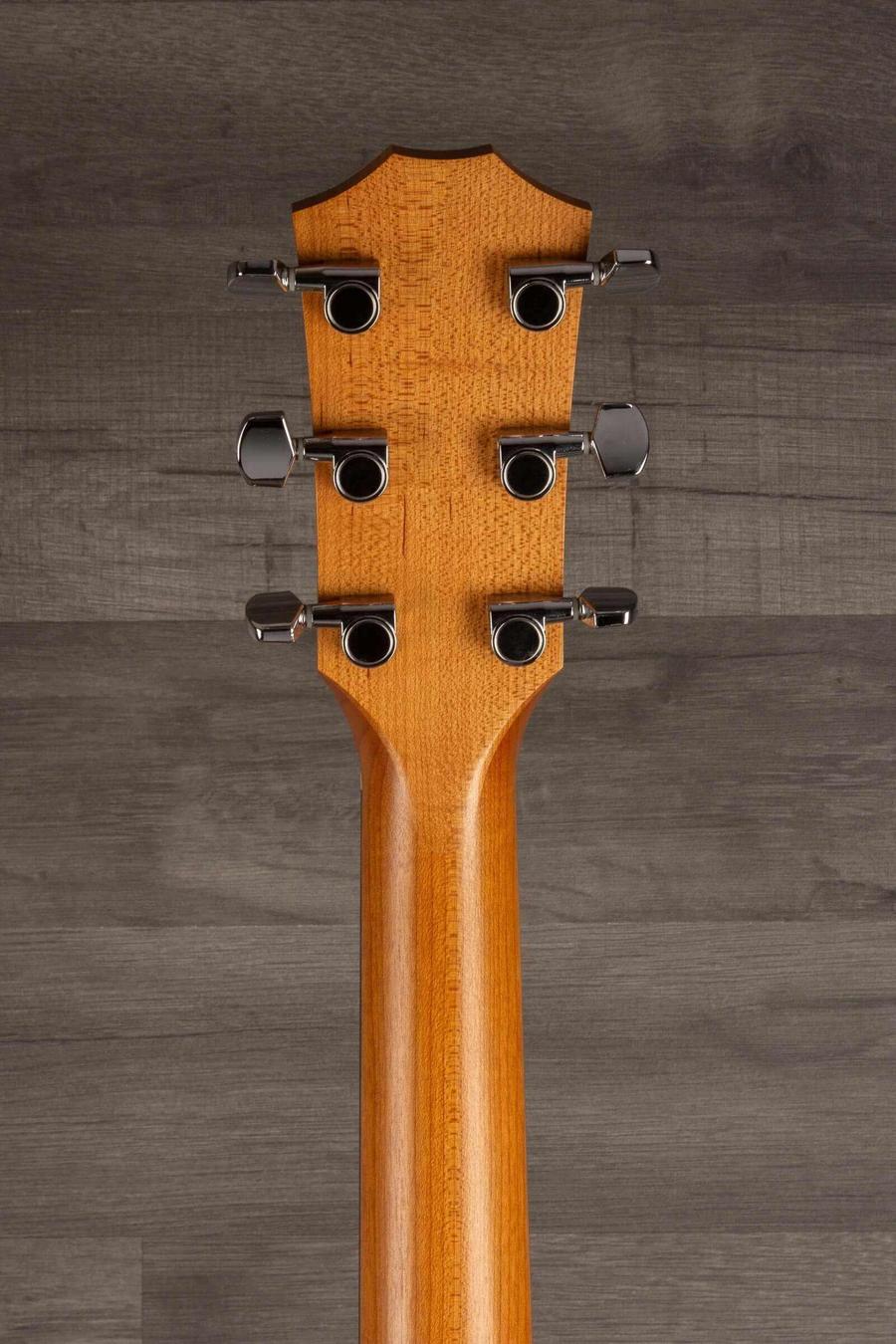 USED - 2022 Taylor 110e guitar headstock view showcasing tuning pegs and neck design.