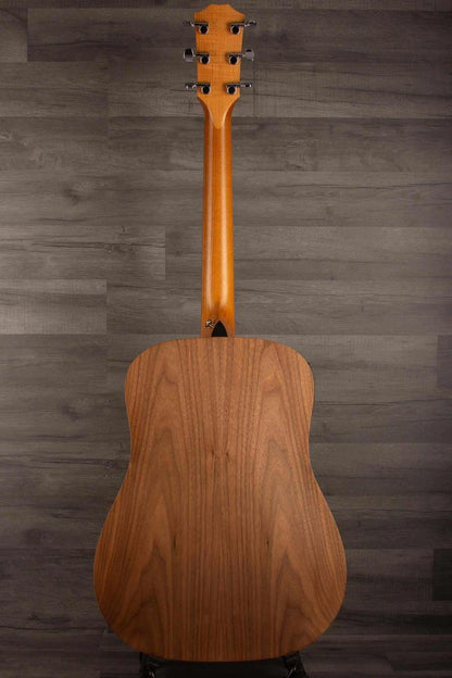 USED - 2022 Taylor 110e back view showcasing the guitar's stunning wood grain and craftsmanship.