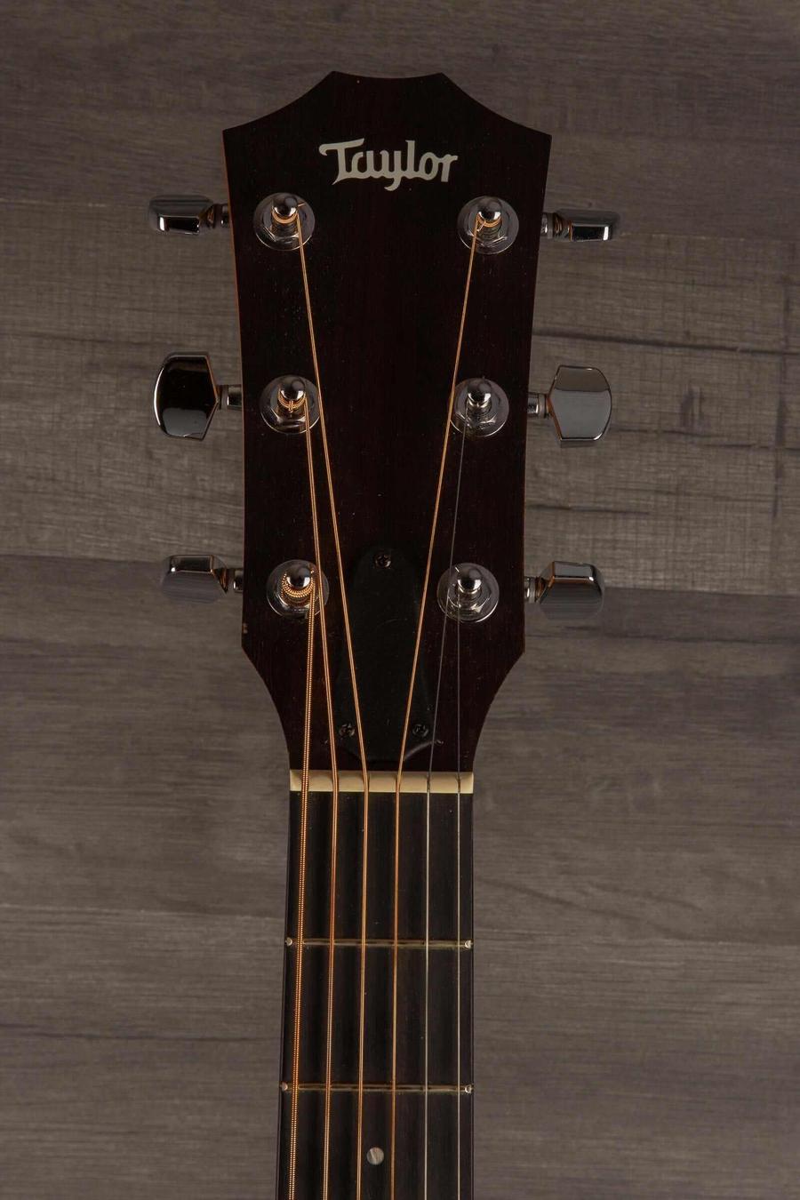 USED - 2022 Taylor 110e guitar headstock showing strings and tuning pegs.