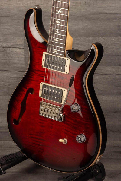 USED - PRS CE24 Semi Hollow - Fire Red close-up showcasing body details and pickups