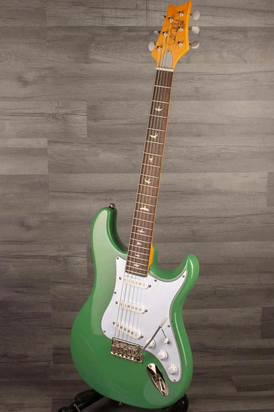 USED - PRS SE Silver Sky - Ever Green guitar showcasing a vibrant green finish and PRS trademark bird inlays.