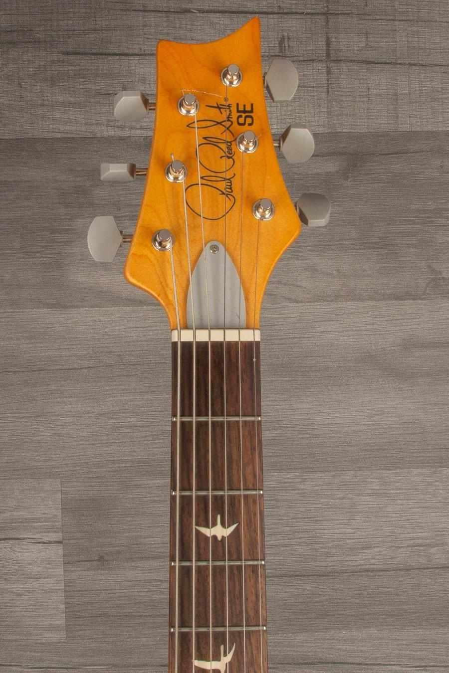 USED - PRS SE Silver Sky - Ever Green headstock and fretboard close-up with PRS bird inlays.