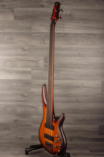 USED - Ibanez SRF700 BBF SR fretless bass - Brown burst flat on a display stand with a smooth finish.