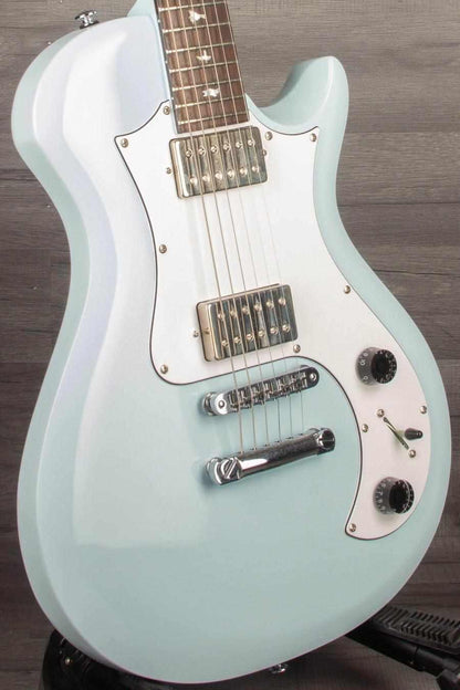 USED PRS SE Starla in Powder Blue, featuring a retro design, all-mahogany body, and original gig bag.