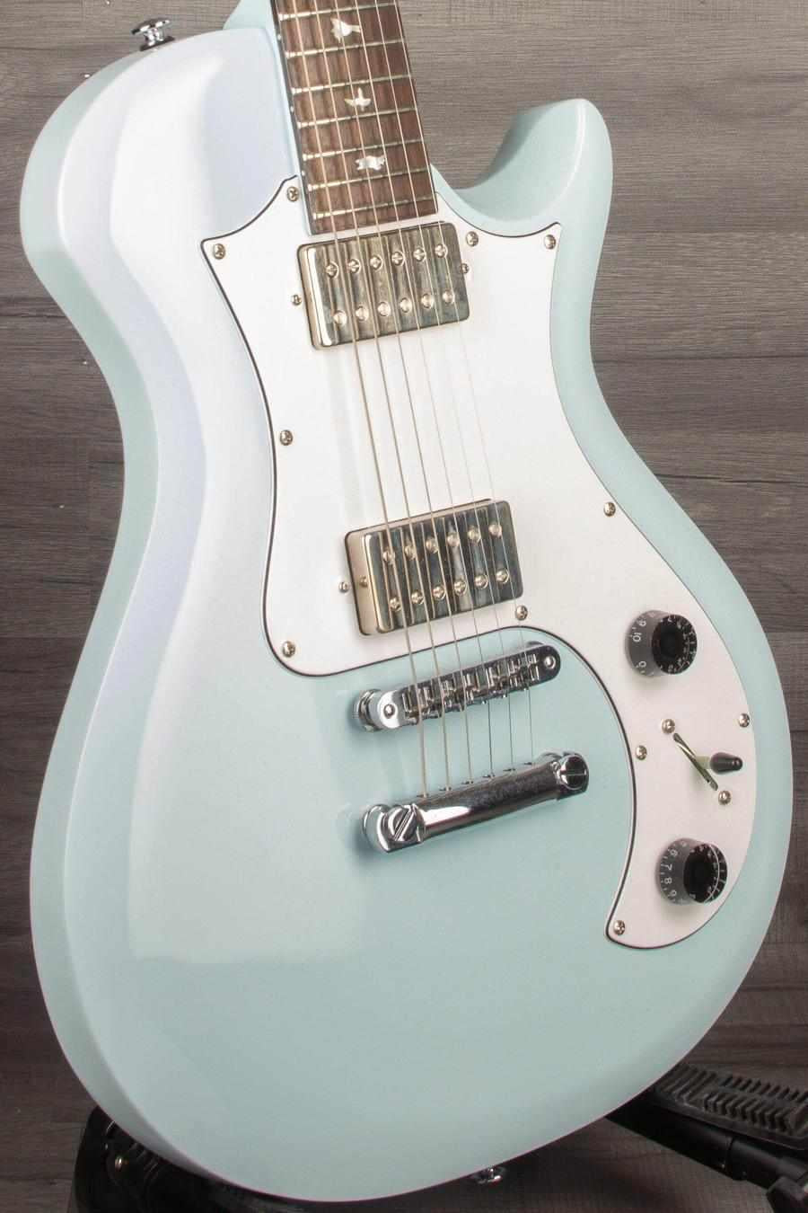 USED PRS SE Starla in Powder Blue, featuring a retro design, all-mahogany body, and original gig bag.